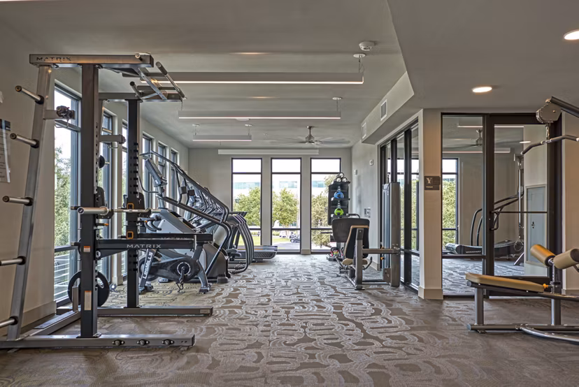 fitness center at Alexan Braker Pointe Apartments