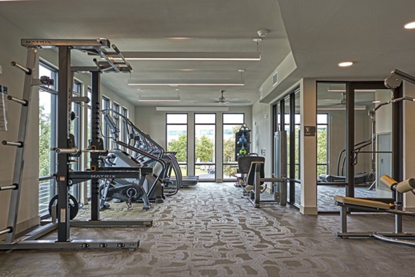 fitness center at Alexan Braker Pointe Apartments