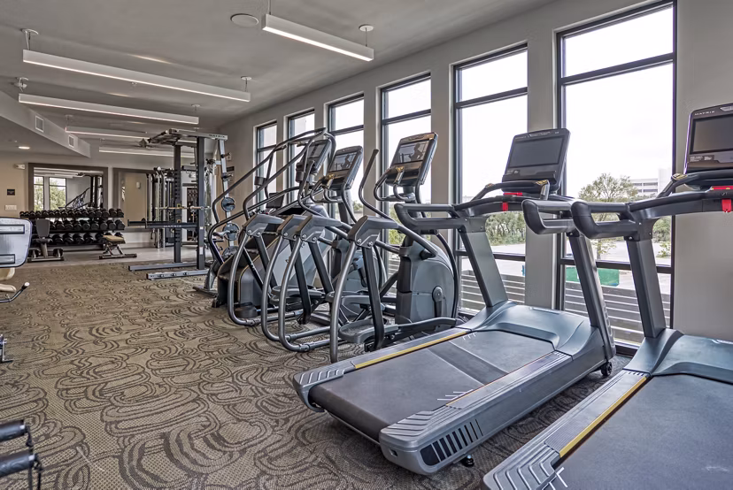 fitness center at Alexan Braker Pointe Apartments
