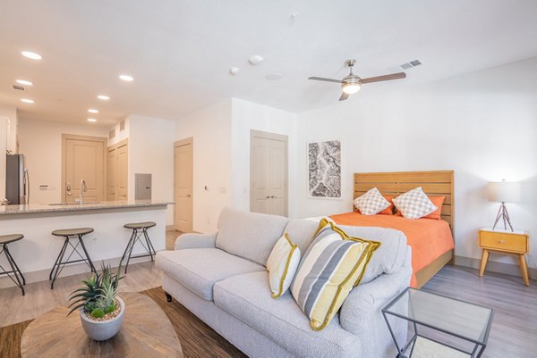 Bright kitchen with modern appliances in Alexan Braker Pointe Apartments