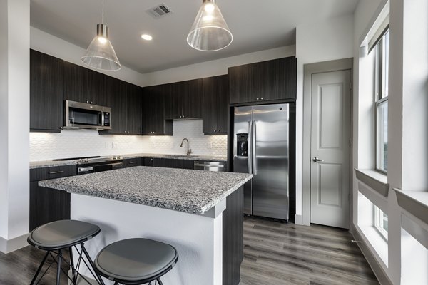 kitchen at Alexan Braker Pointe Apartments