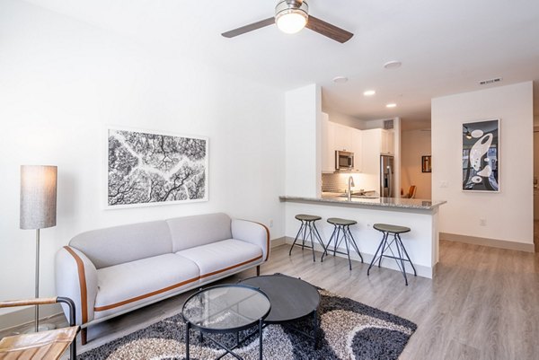 living room at Alexan Braker Pointe Apartments