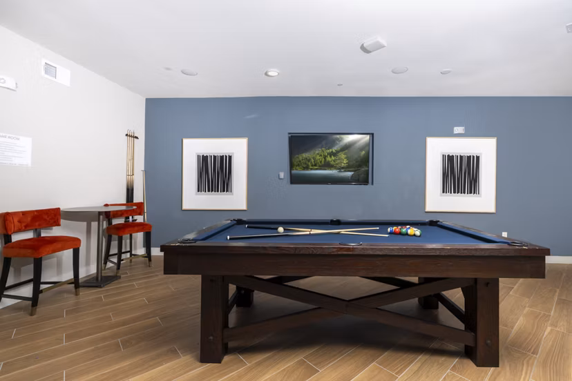 Sage Stone Oak Apartments: Modern clubhouse theater with plush seating