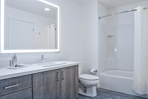 Elegant bathroom with modern fixtures at mResidences Mountain View Apartments