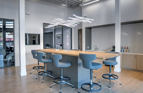 Modern clubhouse with sleek furnishings at mResidences Mountain View Apartments