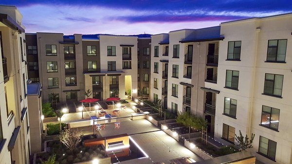 Patio with stylish outdoor seating at mResidences Mountain View Apartments