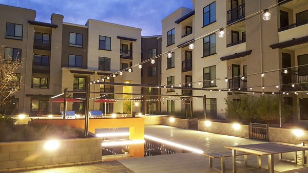 Relaxing grill area and patio at mResidences Mountain View Apartments, perfect for outdoor gatherings and barbecues