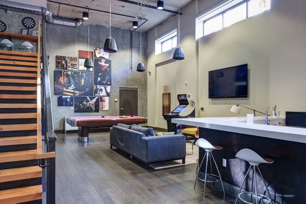 Contemporary clubhouse featuring luxurious lounge areas at mResidences South Lake Union Apartments