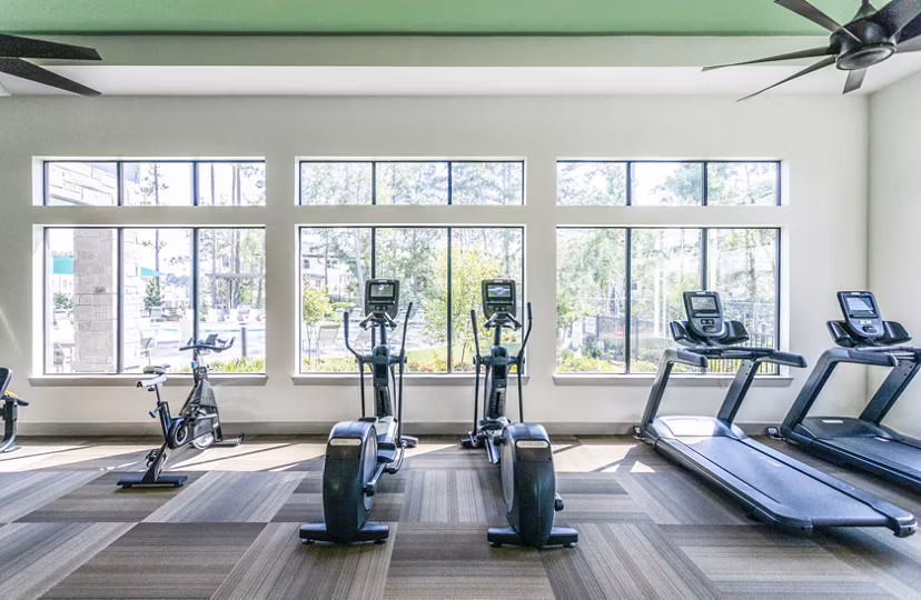 Fitness center featuring modern exercise equipment at luxury apartments