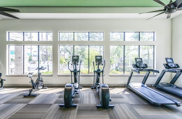 Fitness center featuring modern exercise equipment at luxury apartments