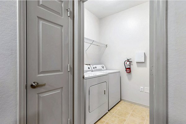 laundry room at Courtney Trace Apartments