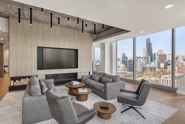 Clubhouse with modern design and cozy seating at 1400 Wabash Apartments, ideal for social gatherings and relaxation in vibrant Chicago neighborhood