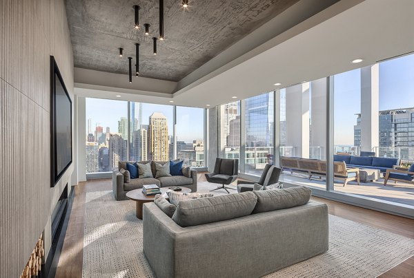 Modern clubhouse featuring comfortable seating and sleek design at 1400 Wabash Apartments