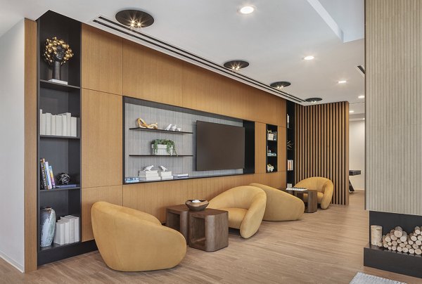 Clubhouse with co-working spaces and modern decor at 1400 Wabash Apartments