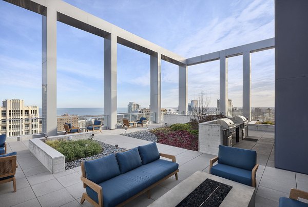 Rooftop deck offering scenic city views at 1400 Wabash Apartments, perfect for relaxation and social gatherings