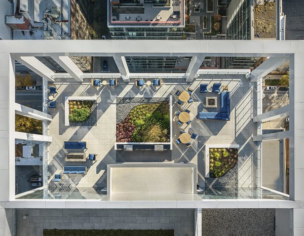 Breathtaking view of city skyline from balcony at 1400 Wabash Apartments, luxurious downtown living spaces