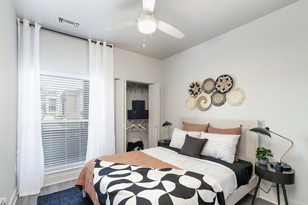 Stylish bedroom with modern decor at The Avante Apartments