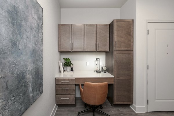 Home office featuring ergonomic desk at The Avante Apartments, luxury living space designed for productivity in a comfortable environment