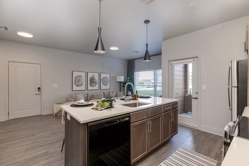 Modern kitchen with stainless steel appliances at The Avante Apartments in Greystar luxury apartments