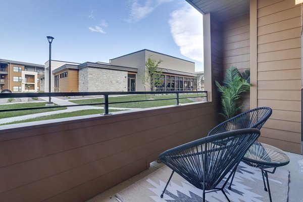 Patio area with modern outdoor furniture at The Avante Apartments offering luxury living spaces