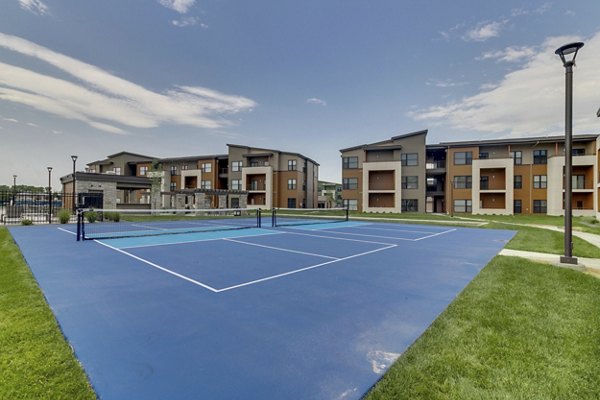 Outdoor sport court at The Avante Apartments in luxury community, ideal for basketball and tennis enthusiasts