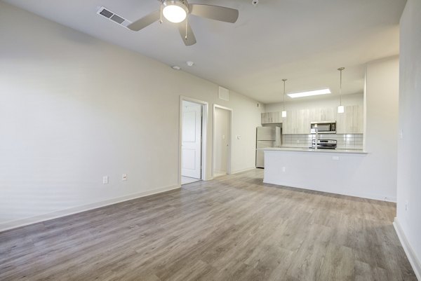 Spacious living room with modern furniture in Trillium Terrace Apartments