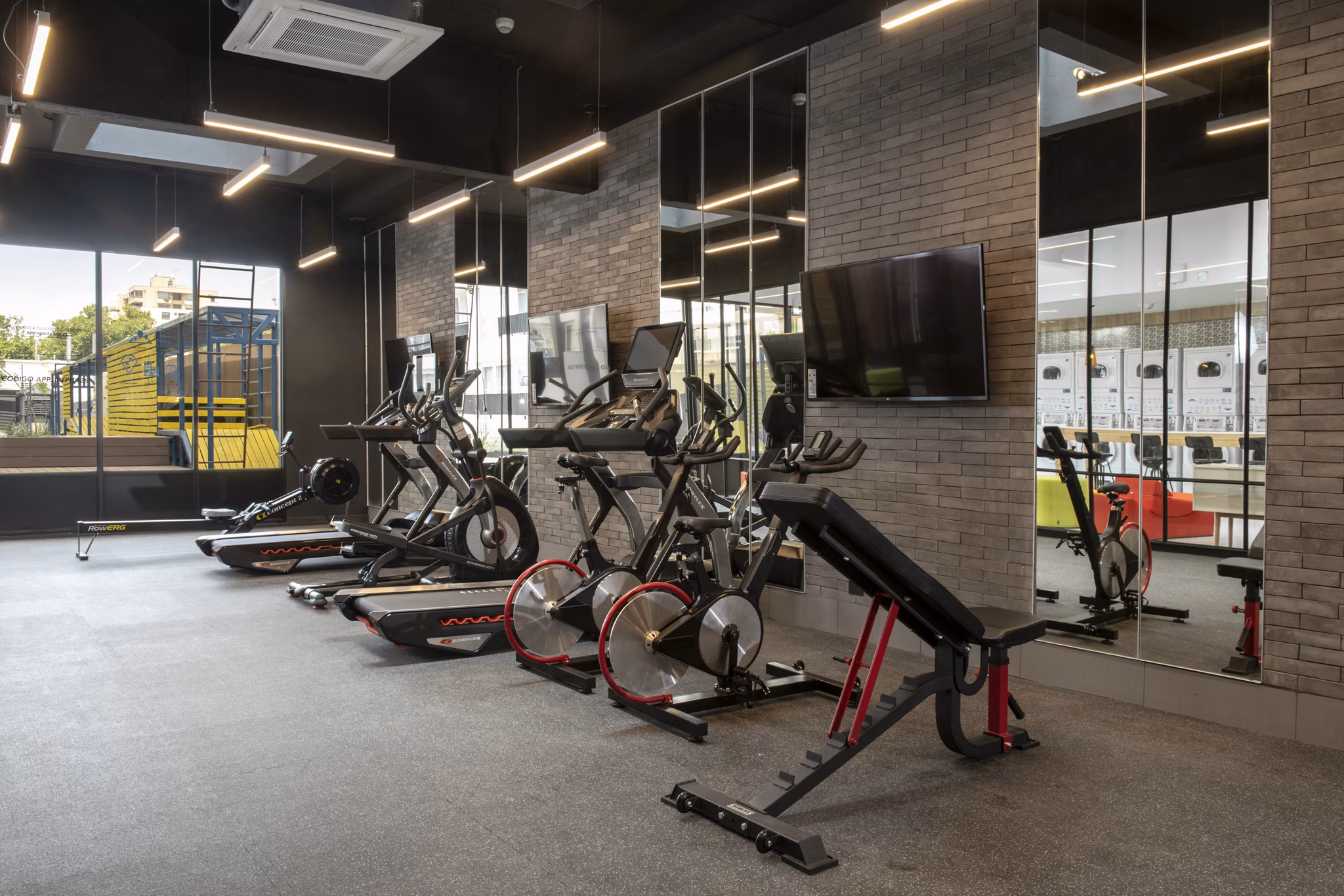 fitness center at Somma Plaza Nunoa Apartments