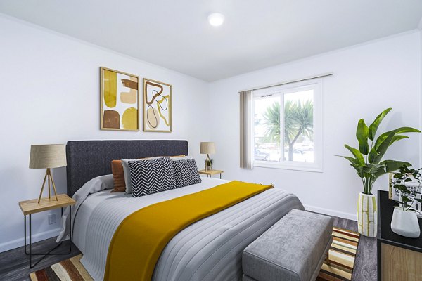 Bedroom featuring modern design and natural light at Coronado/Westlake Village Apartments