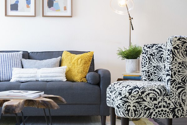 Contemporary living room with stylish furnishings at Coronado Apartments in a Greystar luxury apartment community