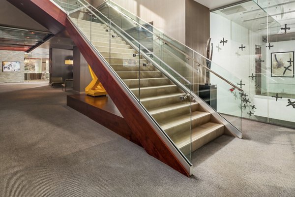 Contemporary clubhouse featuring modern decor at 1600 Glenarm Place Apartments