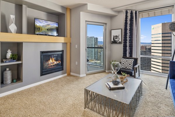 Modern living room with elegant furnishings at 1600 Glenarm Place Apartments, showcasing luxury interiors in a prime location