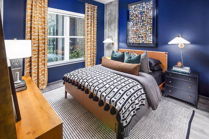 Modern bedroom with elegant decor in Beckon Apartments, a Greystar luxury community, featuring a serene ambiance for ultimate relaxation