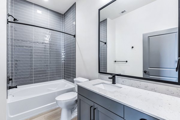 Bathroom featuring modern fixtures at Beckon Apartments, a Greystar luxury community
