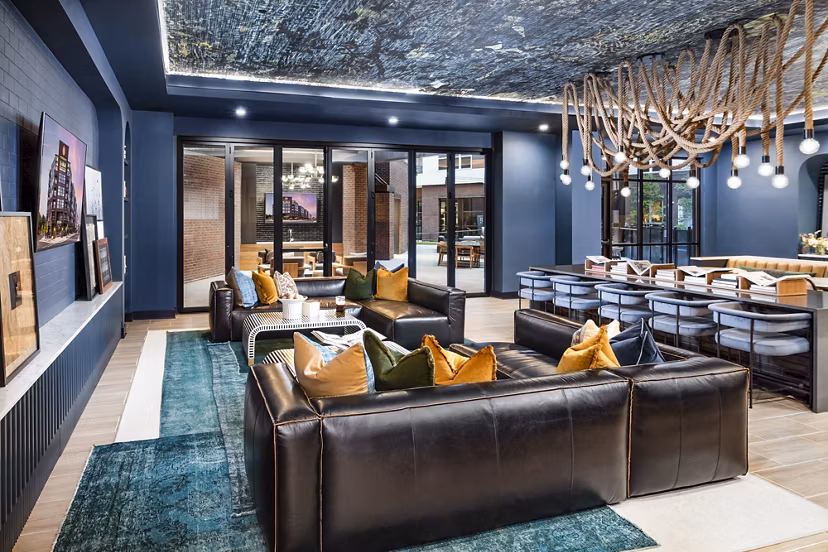 Elegant clubhouse interior with contemporary decor at Beckon Apartments luxury community
