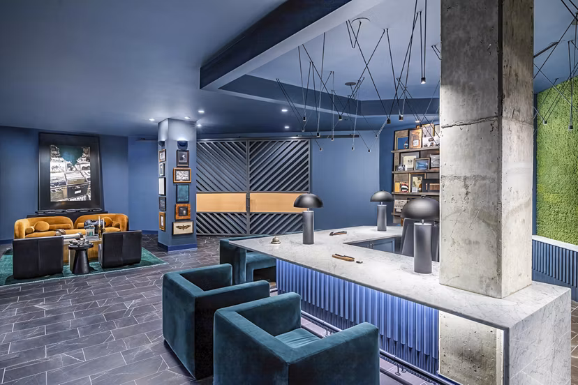 Modern clubhouse with lounge seating at Beckon Apartments