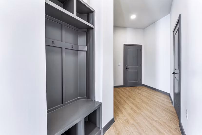 Hallway entrance with stylish decor at Beckon Apartments: Luxury living spaces in a modern setting