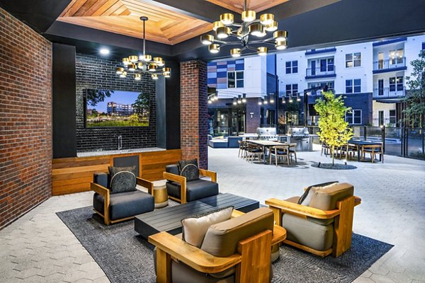 Private patio with modern seating at Beckon Apartments in Greystar luxury setting