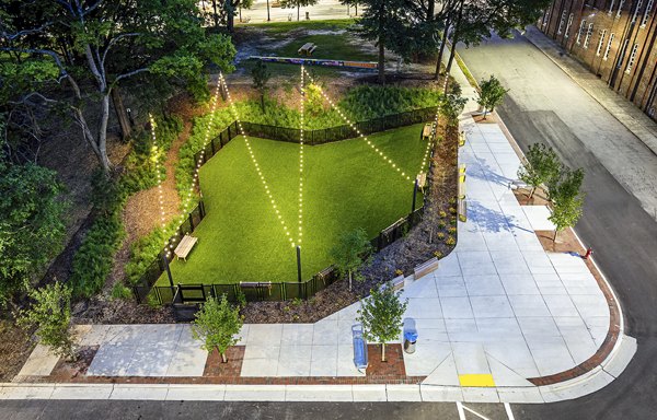 Dog-friendly park with agility equipment at Beckon Apartments, a luxury Greystar community featuring outdoor spaces for resident enjoyment