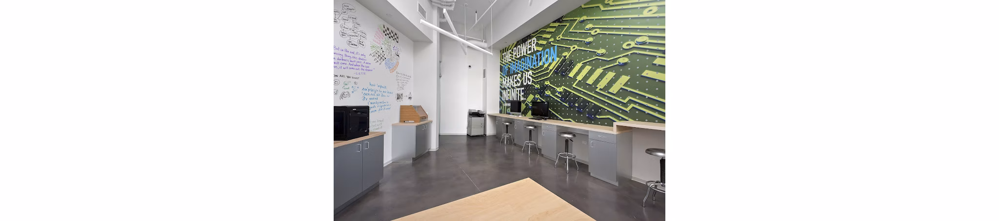 Modern business center with sleek workspaces at 1001 S State Apartments, Chicago