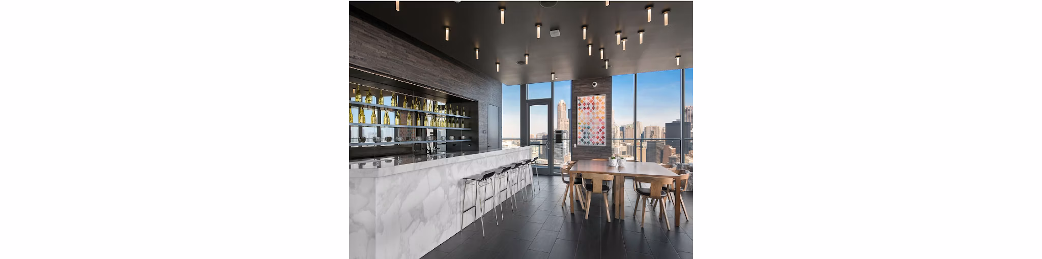 Modern clubhouse with elegant seating and social spaces at 1001 S State Apartments