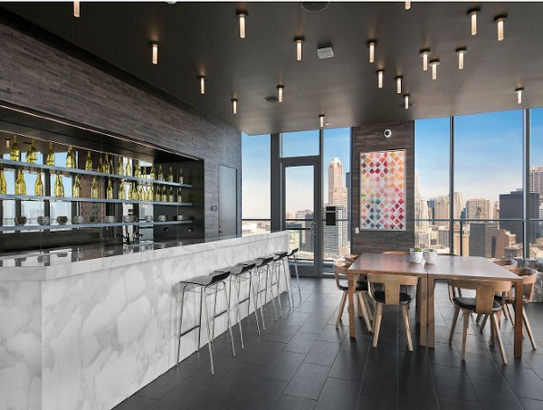 Modern clubhouse with elegant seating and social spaces at 1001 S State Apartments