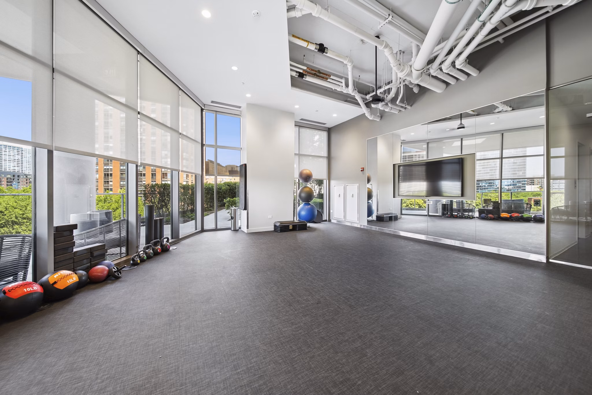 fitness center at 1001 S State Apartments