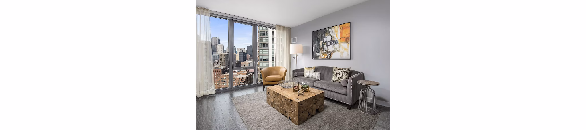 Modern living room with sleek furniture at 1001 S State Apartments