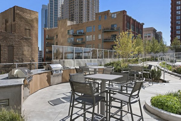 Spacious outdoor grill area for residents at 1001 S State Apartments Enjoy al fresco dining and socializing in this luxurious community space
