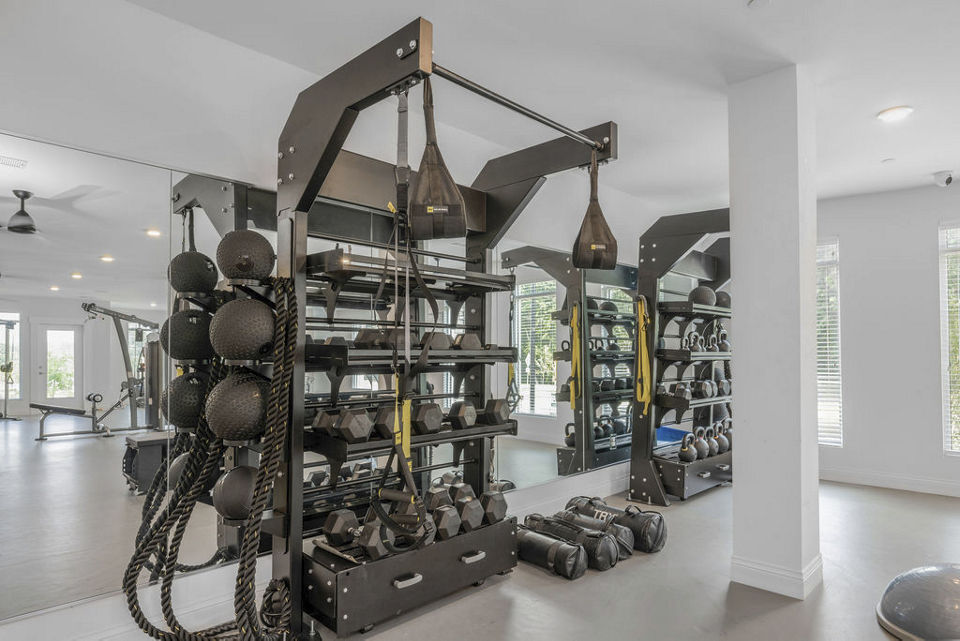 State-of-the-art fitness center at Indigo at Berewick Apartments featuring modern equipment, perfect for an active lifestyle