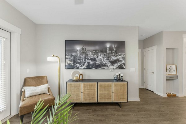 Spacious living room with modern decor at Indigo at Berewick Apartments