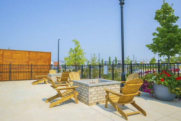 Cozy fire pit on a modern patio at Indigo at Berewick Apartments, Charlotte