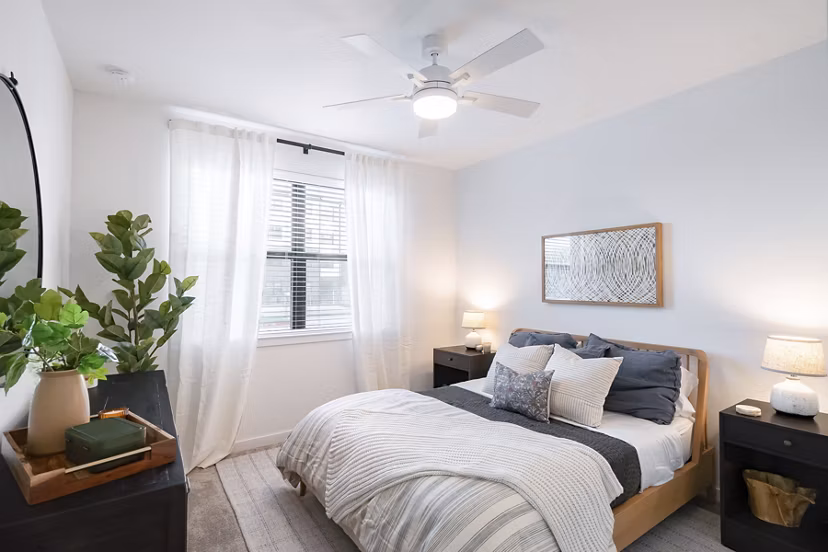 Cozy bedroom with modern decor at Citizen House MLK Apartments