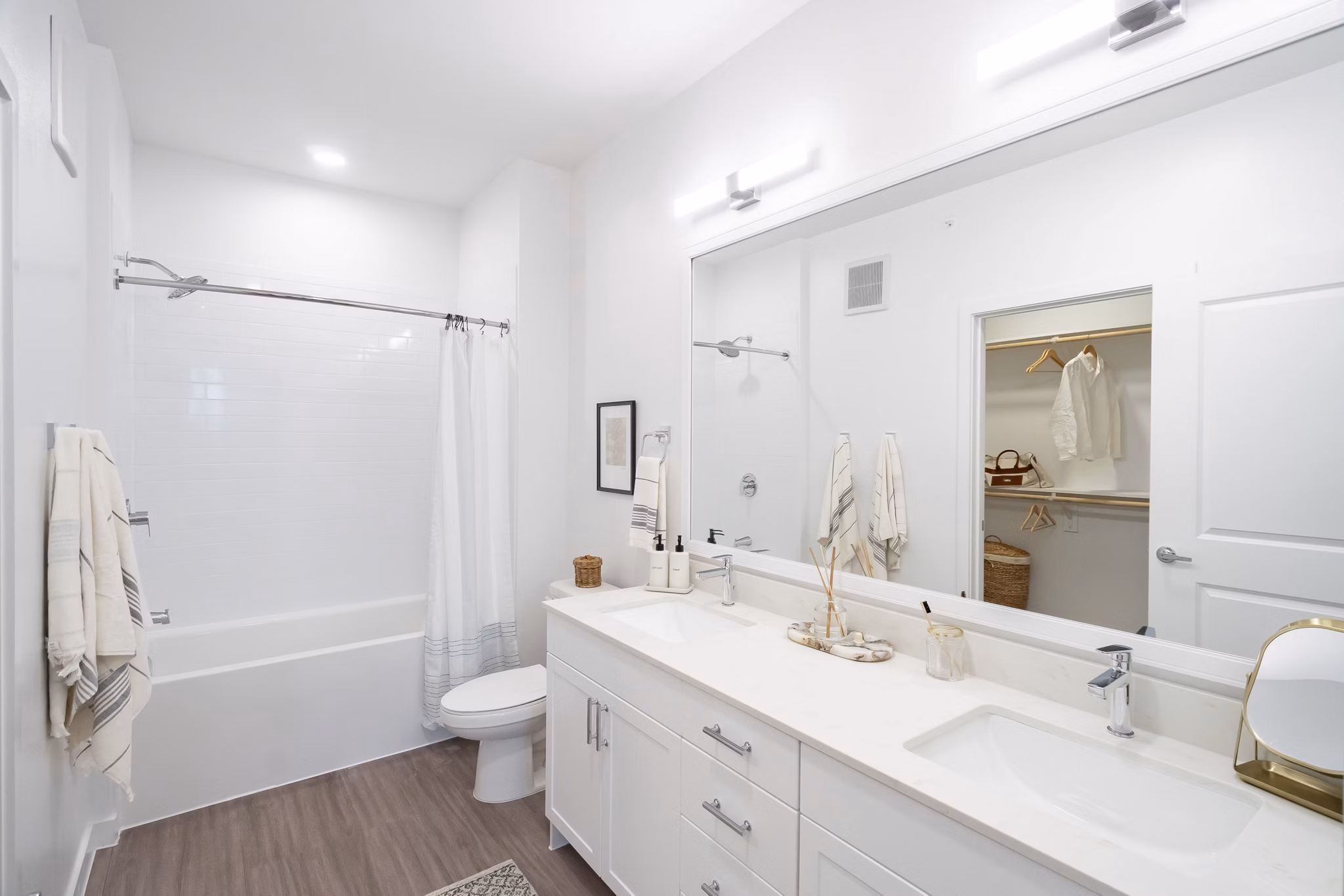 Modern bathroom featuring sleek fixtures and spacious design at Citizen House MLK Apartments