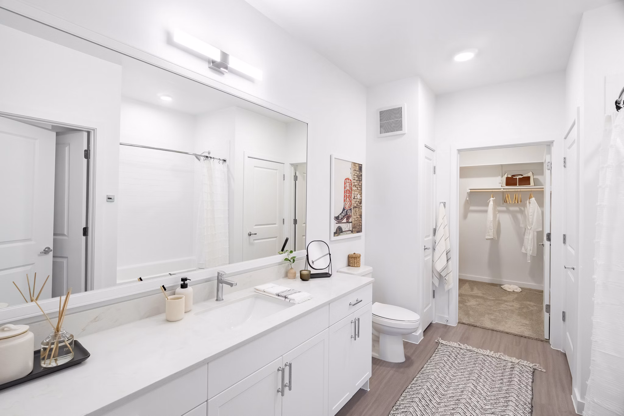 Modern bathroom with sleek fixtures in Citizen House MLK Apartments, showcasing luxury apartment living in central location